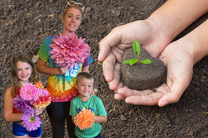 My Daughter, Grandkids and dahlias I grow!